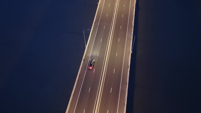 Top Down Aerial View of Bus and Truck Traffic on Padma Bridge at Blue Hour, Bangladesh
