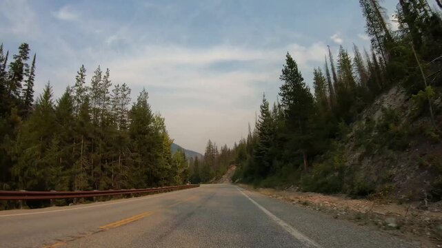 Timelapse North Cascades National Park Road During Forest Fires August 2026. Car Driving Plate Sunny Day USA, Smoke, Mountains, Front Mounted 19