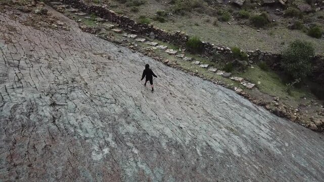 Drone footage of human interaction with fossilized Dinosaur Tracks at Ni&ntilde;u Mayu paleontological site