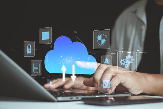 Businessman using laptop with cloud file storage backup, Cloud based file storage and secure data backup solution with encrypted privacy protection. real-time synchronization, access file management.