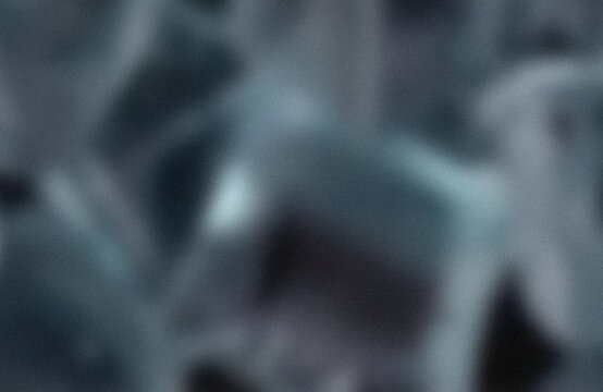Blurred abstract light spot on dark background