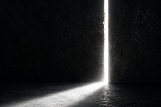 A single beam of white light cutting through a dark crack, strong contrast.
