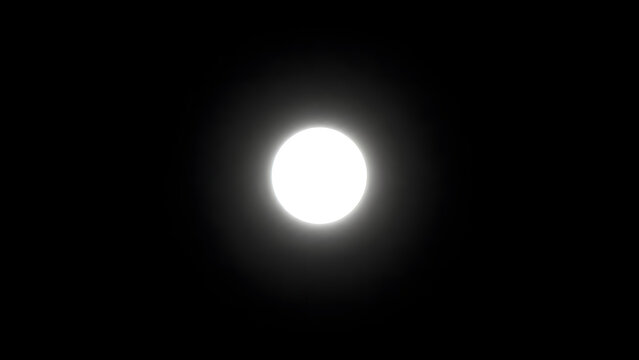 Bright white glowing circle against a dark black background
