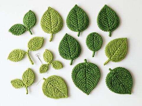 Collection of Handcrafted Green Crochet Leaves in Various Sizes and Shapes for Decorative Craft Projects