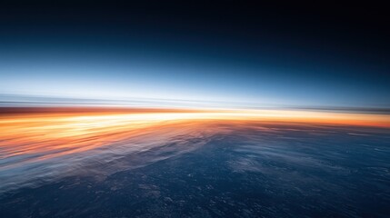 Obraz premium Breathtaking aerial view of Earth's atmosphere at sunrise, showcasing the planet's curve and vibrant sky