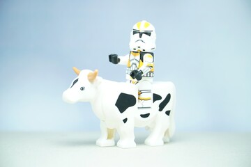 Fototapeta premium Indonesia - September 21, 2023 : Mini toy of action figure with blurred background. Farmer concept design.