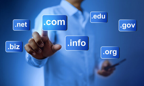 Domain name concept with a man touch on  dot com to be a website domain in business webpage globally recognized .com to default choice