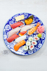 Assorted nigiri and sushi rolls plate © Phototora