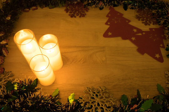 Candles with Felt Christmas Trees Blurred Behind