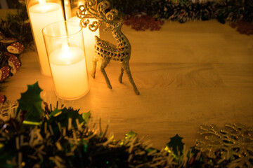 Close Crop of Candles and Reindeer Figurine © Tony