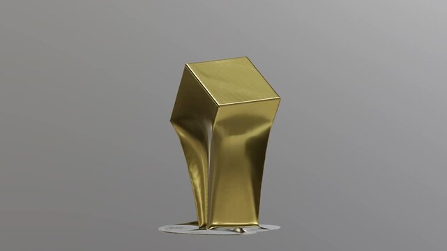 Golden cube melting and splashing on a gray surface, with liquid gold flowing down its sides and spreading in jagged waves.
