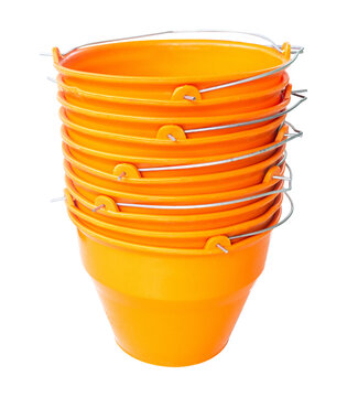a pile of orange buckets separated on a white background