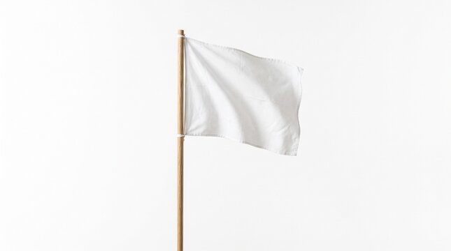 A plain white flag waves gently on a wooden pole against a clean white background symbolizing surrender or peace