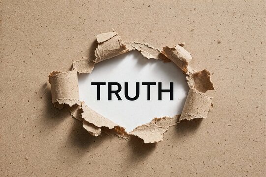 The word truth revealed through a torn hole in brown craft paper