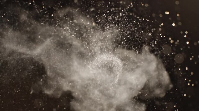 Water splash with bokeh lights on dark background
