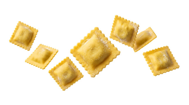 Raw ravioli pasta squares arranged floating in the air isolated on a transparent background for culinary menu and food template.
