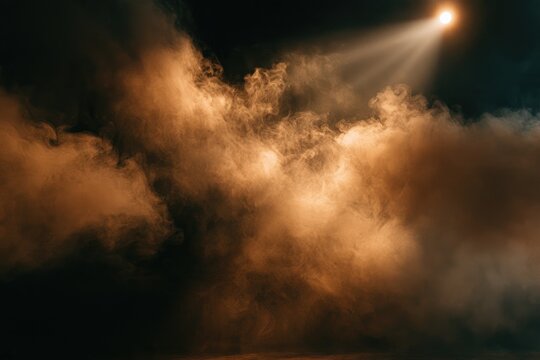Bright spotlight pierces dense, illuminated smoky atmosphere