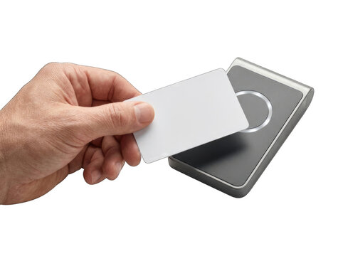 Hand holding a blank smart card near an NFC reader for contactless access