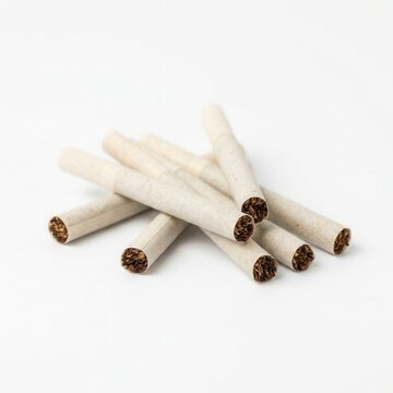 Unfiltered Cigarettes Pile On White Seamless Background Studio Shot