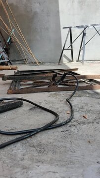 Ground Wire Cable Clamped to Iron Frame with Tiny Insect Crossing Lens