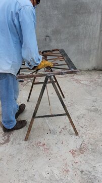 Checking Stability of Newly Welded Table Frame Made from Recycled Iron