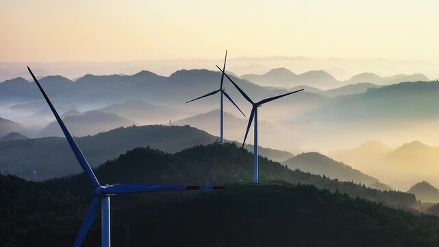 4K Aerial View Wind Power Generators on Mountains