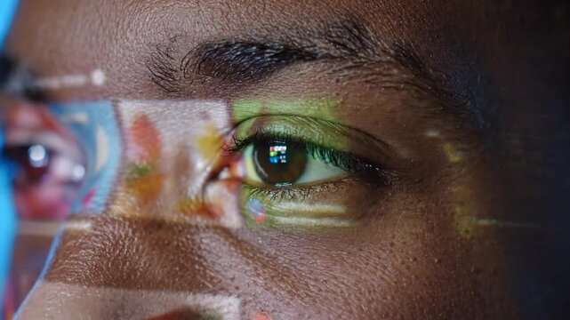 Macro Shot of Young Adult Male Eye with Digital Screen Reflection During Late Night Internet Browsing and Social Media Chatting Session on High Resolution Display