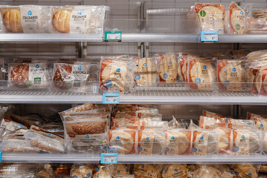 August 20, 2026, Amsterdam, Netherlands - Supermarket shelves stocked with various packaged bread products from Albert Heijn