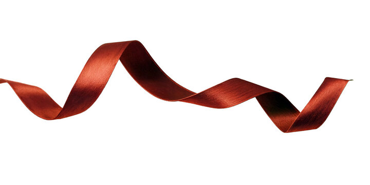 Red satin ribbon flowing in elegant waves isolated on transparent background for design use