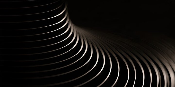 Abstract metallic curves swirling in darkness with light highlights