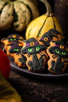 Spooky Halloween cookies in shape of black cat