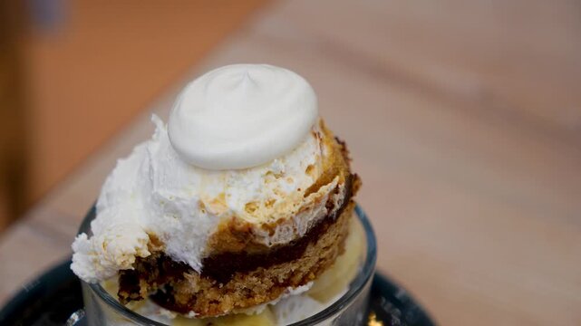 Banoffee with banana and caramel sauce in cafe restaurant