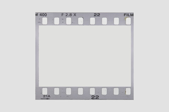 Retro single photographic film negative frame border for photo overlay and post design.