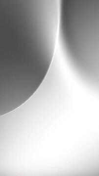 Abstract light gradient motion animation featuring soft curved waves shifting across a clean minimalist monochrome background for creative design projects