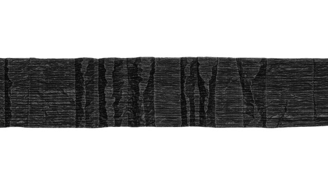 Rough textured black paper strip with vertical creases, isolated on transparent background