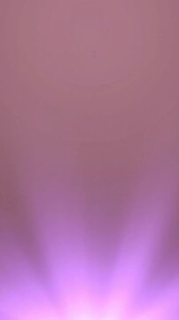 Soft purple light beams radiating upwards from bottom in vertical motion digital background animation for creative and atmospheric design projects