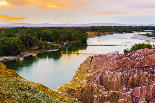 Colorful Beach, also known as Wucaitan, in Burqin County, Altay Prefecture, Xinjiang, China. The scenic landscape features colorful Yardang rock formations along the Irtysh River, surrounded by a




