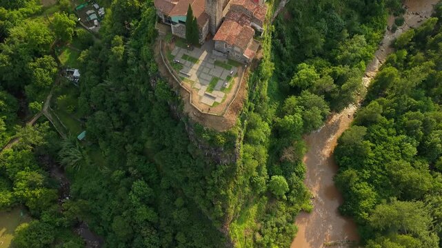 Aerial View of Castellfollit de la Roca Village on a Forested Cliff