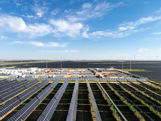 solar photovoltaic power station under blue sky and white clouds © zhu difeng