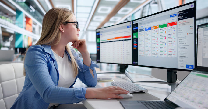 Woman Examines Medical Billing Software