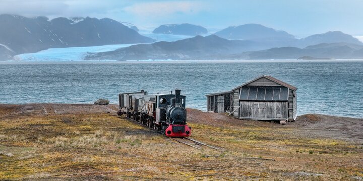 Historic train dating from 1917 transporting coal to the harbor, Ny-Alesund, Spitsbergen Island, Svalbard Archipelago, Norway