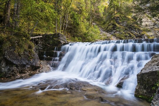 Wild stream with a waterfall in the P&ouml;llatschlucht, Schwangau, Ostallgaeu, Allg&auml;u, Swabia, Bavaria, Germany