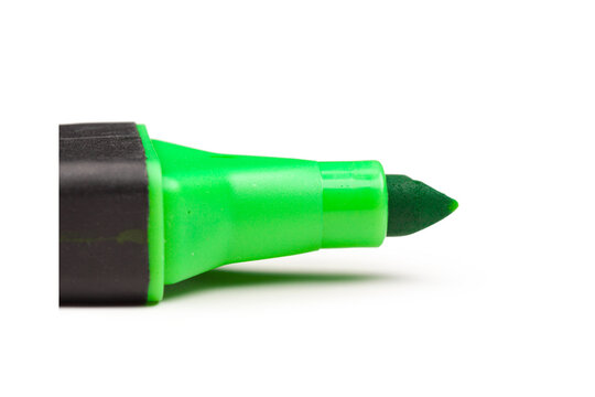Close up of a green highlighter marker tip isolated on white background with office supply school supplies writing instrument art supply educational tool felt tip
