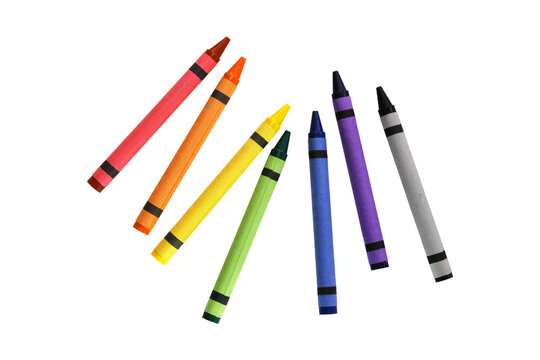 Group of wax crayons standing upright on a white background with art supplies colored crayons drawing tools school supplies writing instruments kids crafts

