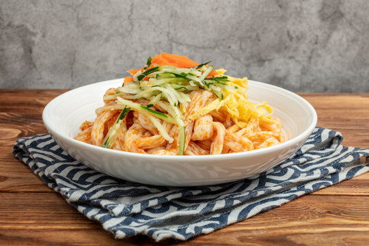 Crab Salad with Cucumber and Carrot in a Bowl