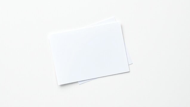 Two blank white paper cards stacked on top of each other