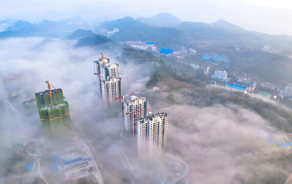 Yichang City Morning Mist - Tall Buildings Rising Above Clouds Like Fairyland