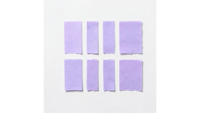 Top view of eight purple paper rectangles arranged in two rows isolated on white background