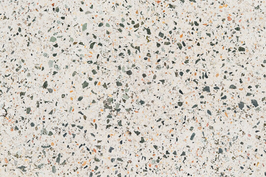 Terrazzo texture featuring a natural speckled surface with scattered stone chips, subtle tonal variation, and a durable architectural finish. Ideal for flooring, walls, countertops, tiles, interiors, 