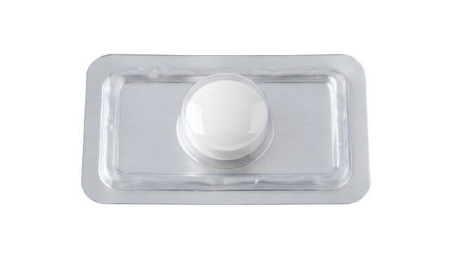 Emergency contraceptive pill in blister pack, morning after pill for birth control, single white tablet in foil packaging